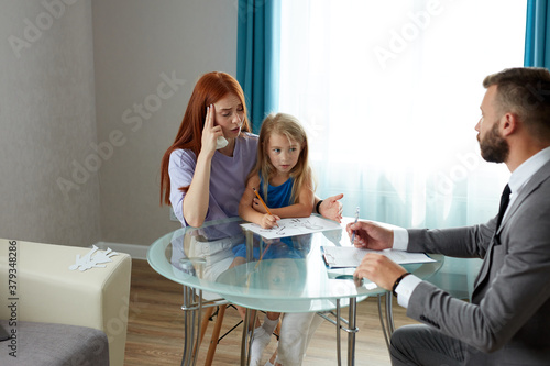 single lonely mother with kid girl and psychologist, husband left his family, went to another mistress. sad depressed redhead woman get support and help by professional therapist