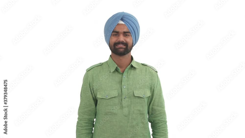 Portrait of laughing Indian man pointing on camera with index finger expressing mockery emotion. Guy making fun of someone. Isolated on white background Portrait of laughing Indian man pointing on camera with index finger expressing mockery emotion. Guy making fun of someone. Isolated on white background