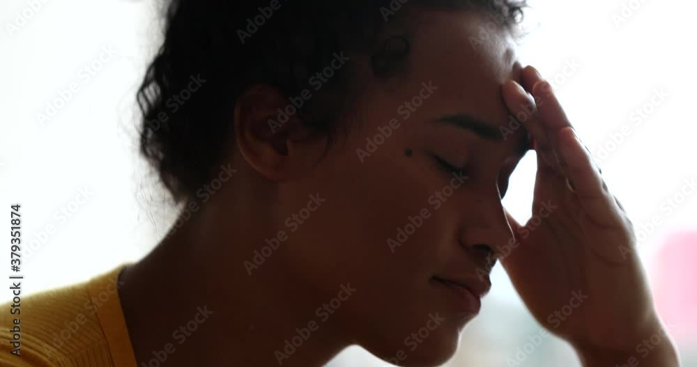 Depressed black woman feeling stress and anxiety Depressed black woman feeling stress and anxiety
