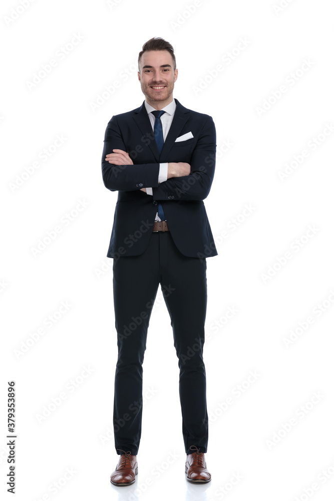 Cheerful businessman laughing with hands folded Cheerful businessman laughing with hands folded