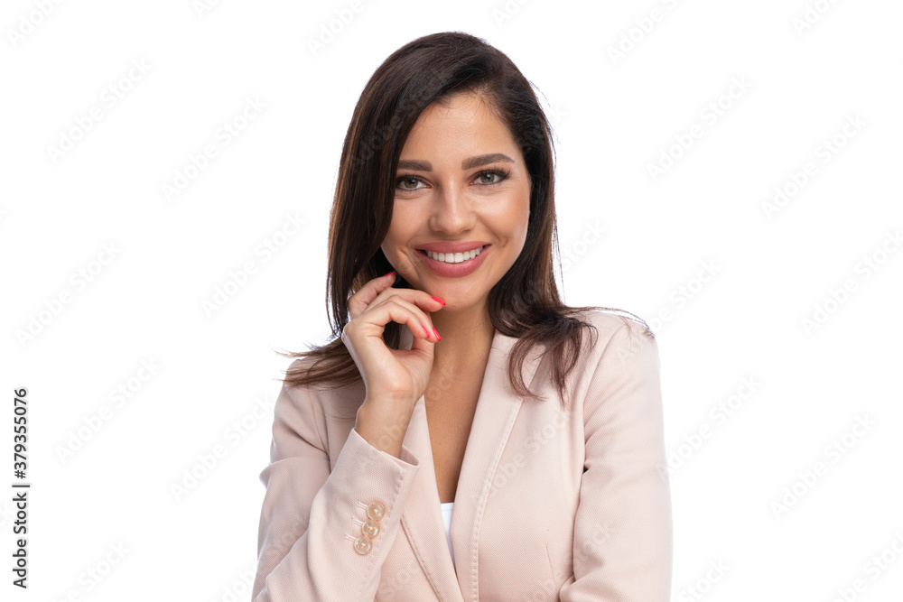 Closeup of positive businesswoman smiling while standing Closeup of positive businesswoman smiling while standing
