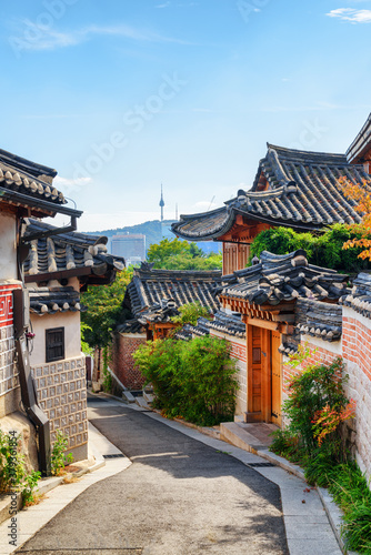 Awesome cozy old narrow street and traditional Korean houses photo