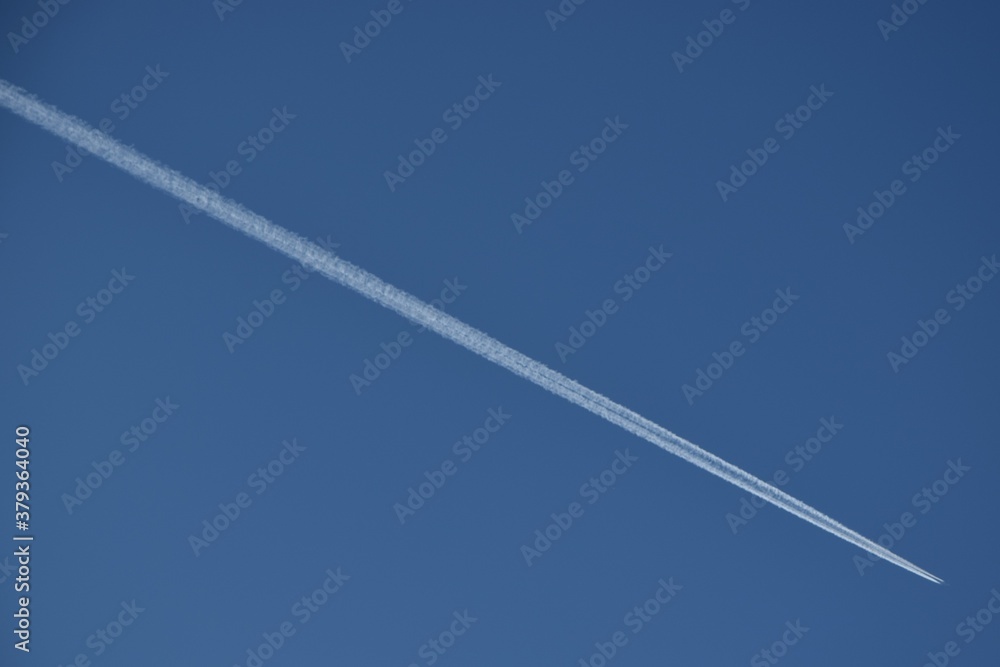 Single airplane in the blue sky. Single airplane in the blue sky.