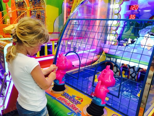 child playing with balls