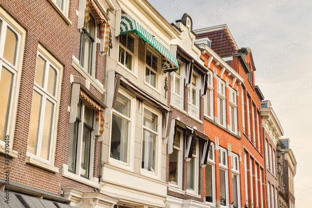 Fototapeta premium Row of ancient houses in the Dutch city center of Leiden