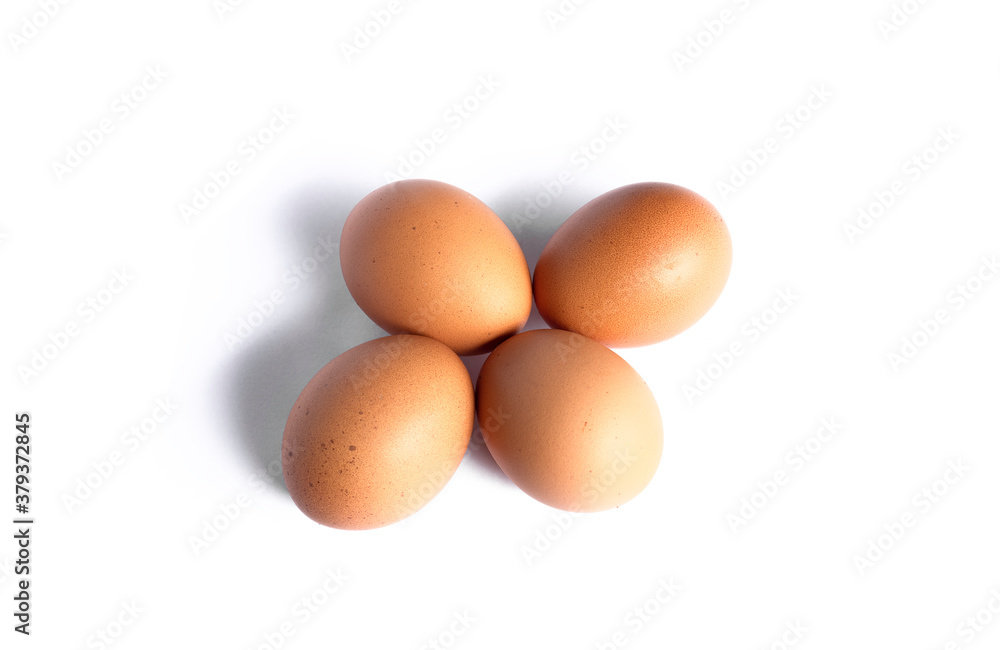 Four chicken eggs isolated on white background. Four chicken eggs isolated on white background.