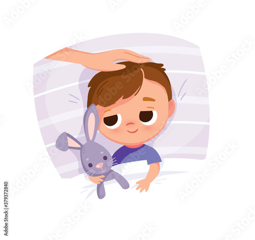 Portrait of sleepy baby in the bed. Bed time. Boy holding rabbit toy. Bunny rabbit.