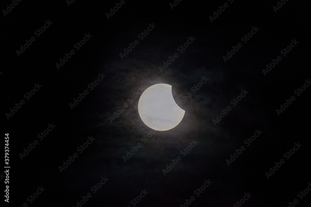 Partial eclipse 2015 with clouds. Partial eclipse 2015 with clouds.