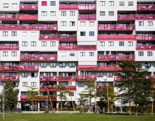 apartment house with pink balconies