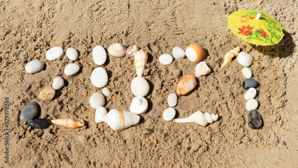 Number 2021 New Year Written with Stones on Sea Shore Number 2021 New Year Written with Stones on Sea Shore