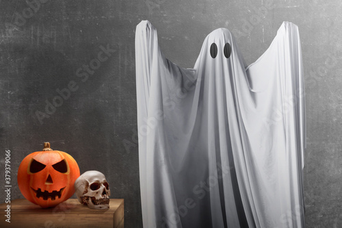 White ghost haunting with black wall background