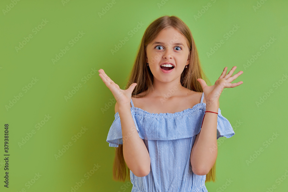 surprised girl emotionally react on news, she expresses her emotions at camera, rised hands, look at camera surprised girl emotionally react on news, she expresses her emotions at camera, rised hands, look at camera