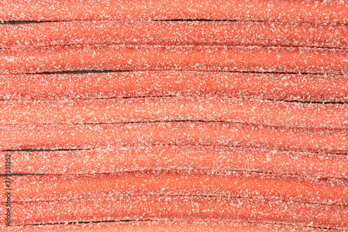 chewy strawberry flavored gummy candy ropes