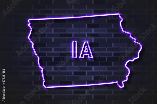 Iowa map glowing neon lamp or glass tube on a black brick wall