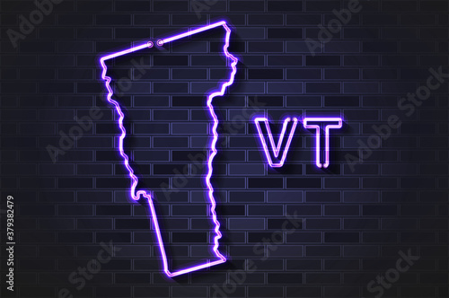 Vermont map glowing neon lamp or glass tube on a black brick wall