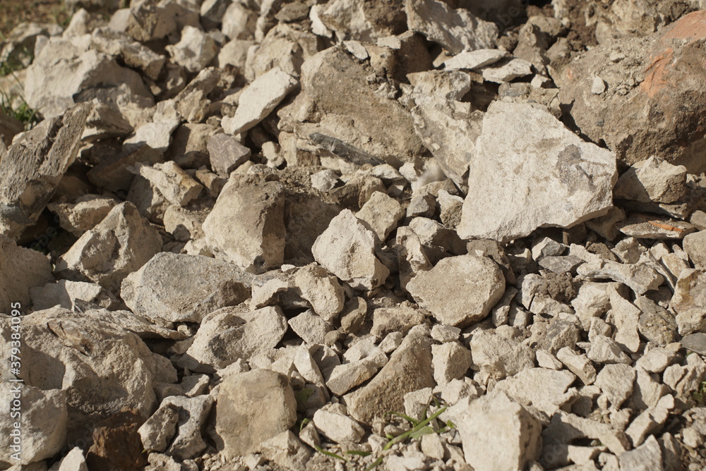 many pieces of broken concrete many pieces of broken concrete