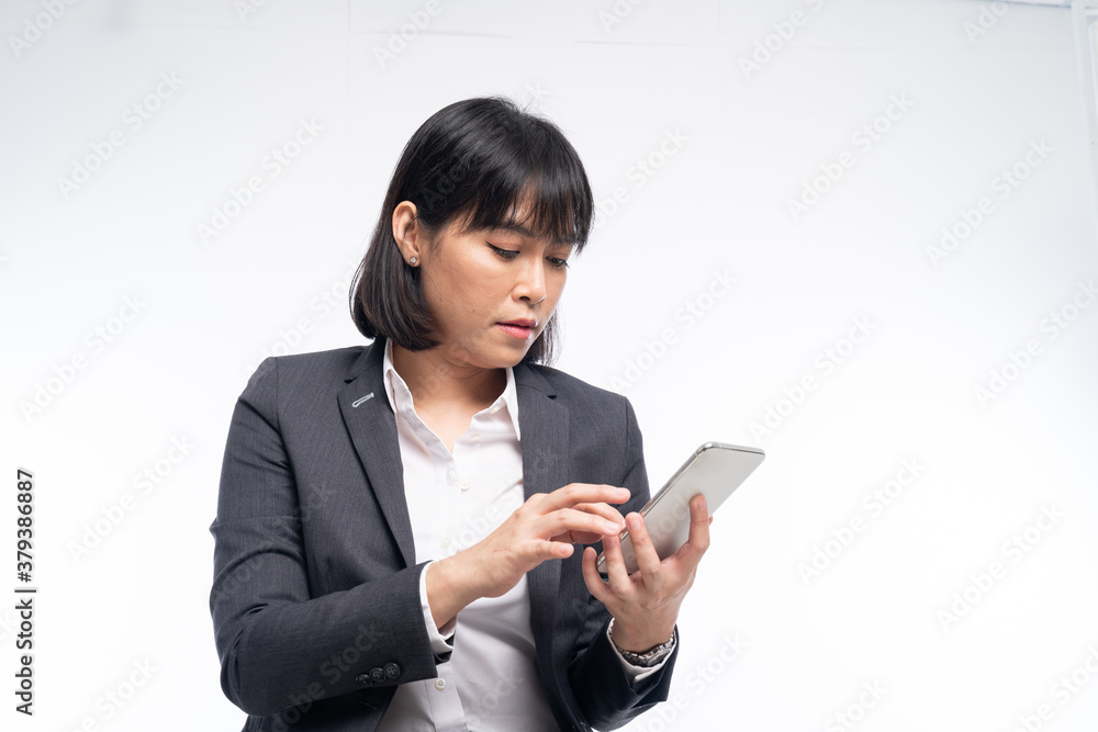 Business women use smartphones to work On white background Business women use smartphones to work On white background