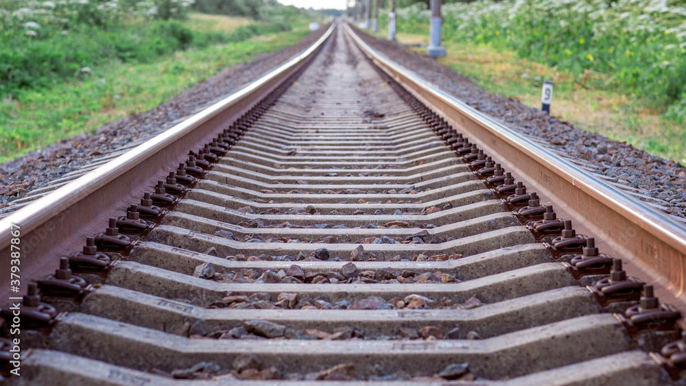 The railway track goes into the distance. The railway track goes into the distance.