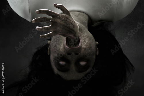 Slika na platnu Woman possessed on dark background