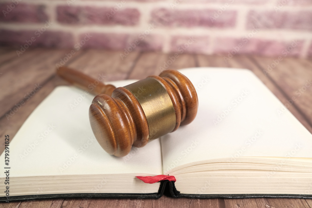 Close up of gavel on a open book with copy space 