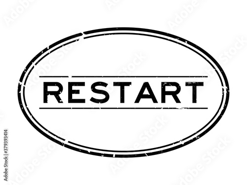 Grunge black restart word oval rubber seal stamp on white background