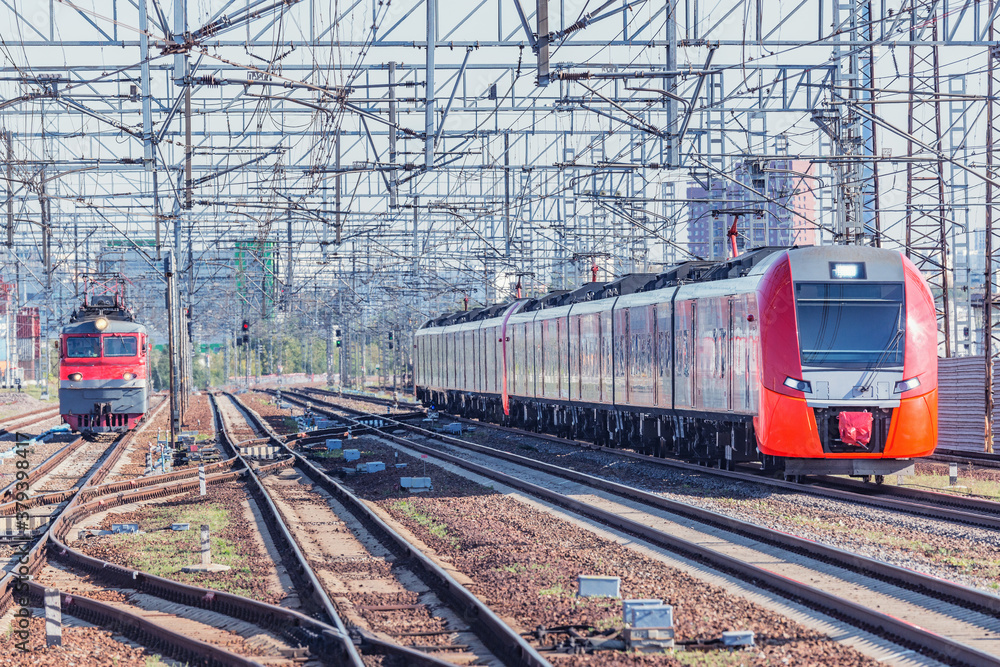 Highspeed train and locomotive on the station. Highspeed train and locomotive on the station.