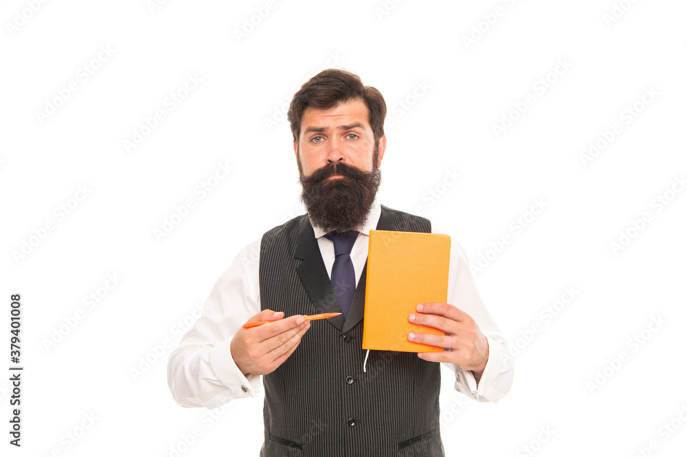 Serious bearded man point writing pen at school book isolated on white, information about education Serious bearded man point writing pen at school book isolated on white, information about education