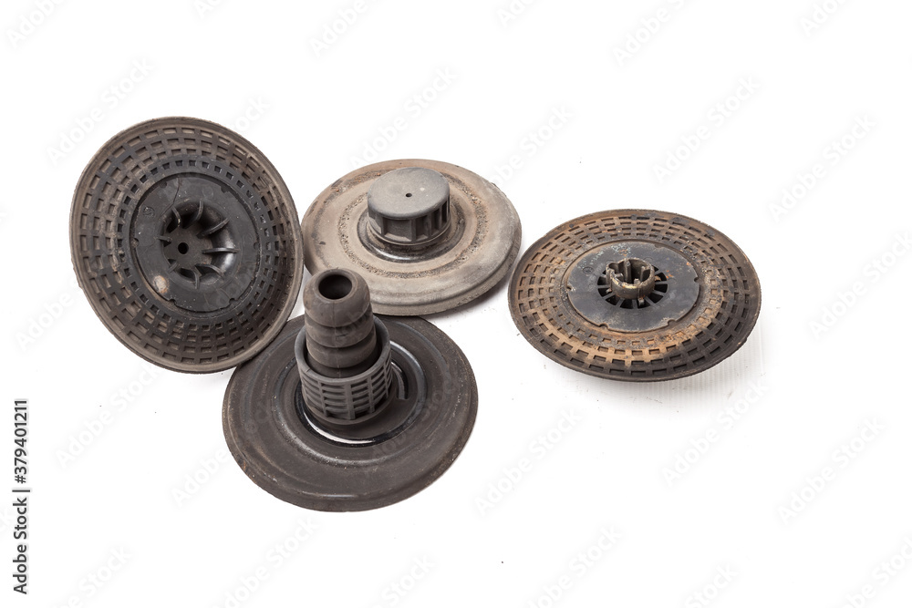 Set of plastic spring support for car suspension on a white background. Auto service industry. Spare parts catalog. Set of plastic spring support for car suspension on a white background. Auto service industry. Spare parts catalog.