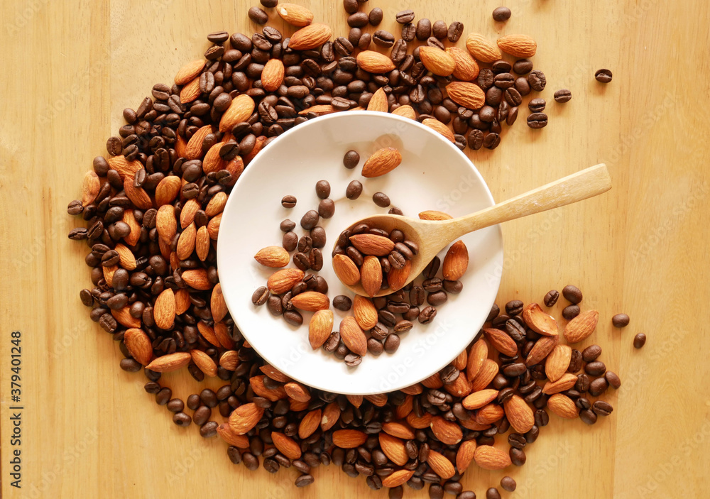 mixed almond and coffee background mixed almond and coffee background