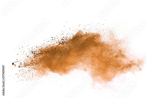 Brown powder explosion isolated on white background. © piyaphong
