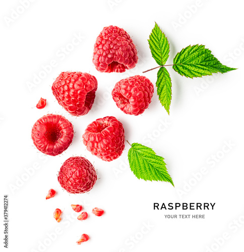 Fotografia Raspberries and leaves creative layout