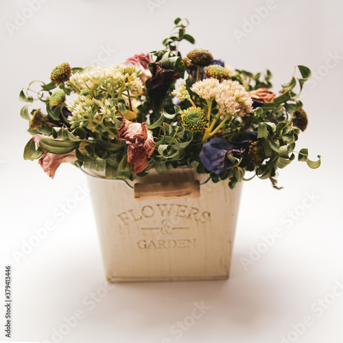 Dried summer flowers bouquet for gift to loved ones. Pot with an inscription 