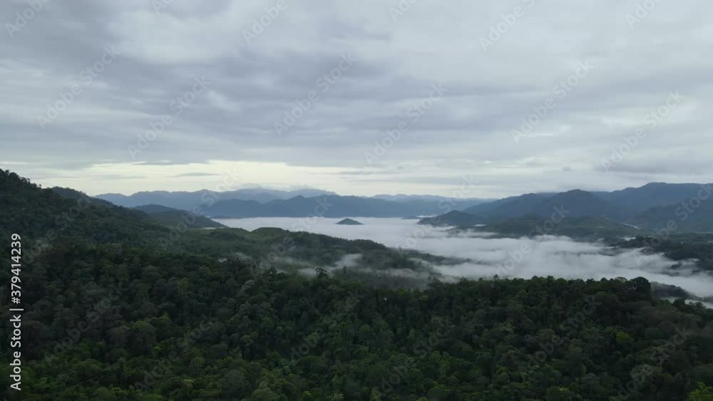 Epic morning Flight over Beautiful mountains and clouds at sunrise on Mountains in Thailand. Aerial view of nice rainy morning in Mountains. Epic morning Flight over Beautiful mountains and clouds at sunrise on Mountains in Thailand. Aerial view of nice rainy morning in Mountains.