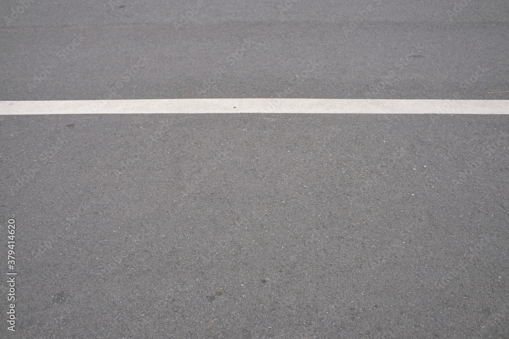Fototapeta premium Begrenzung auf Asphalt