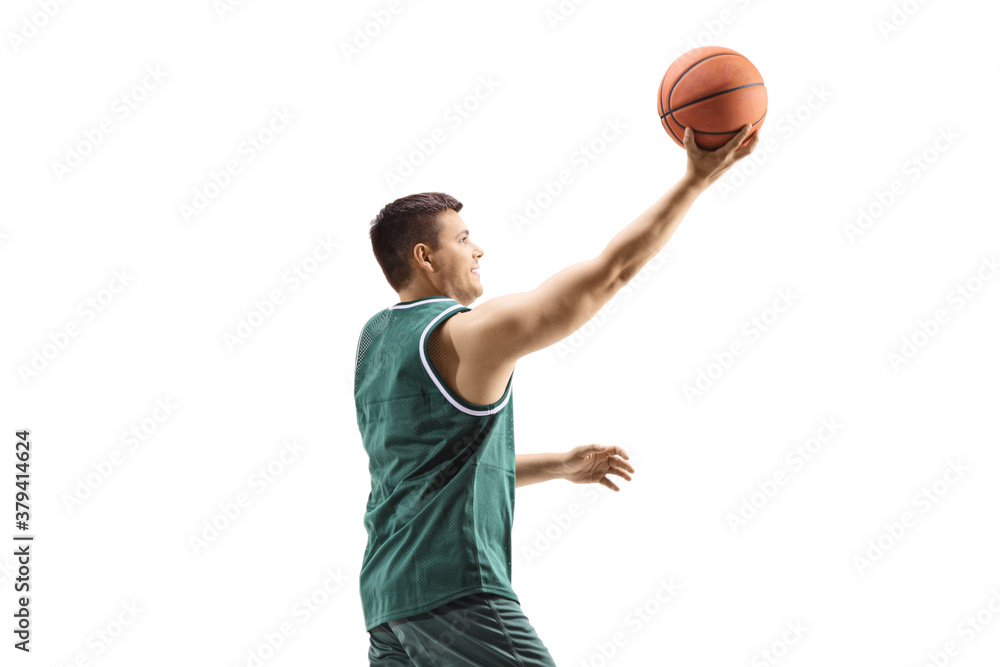 Basketball player laying a ball