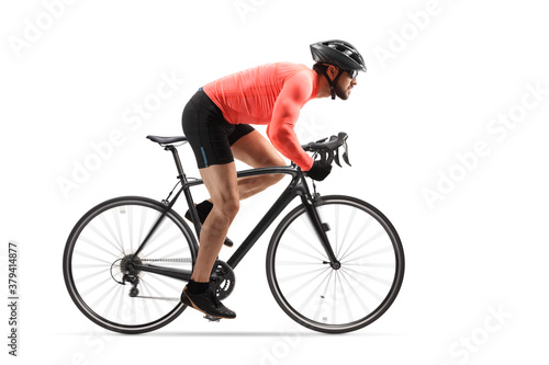 Cuadro en lienzo Profile shot of a cyclist with helmet and sunglasses riding a road bicycle