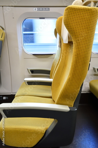 Yellow train seats nobody use