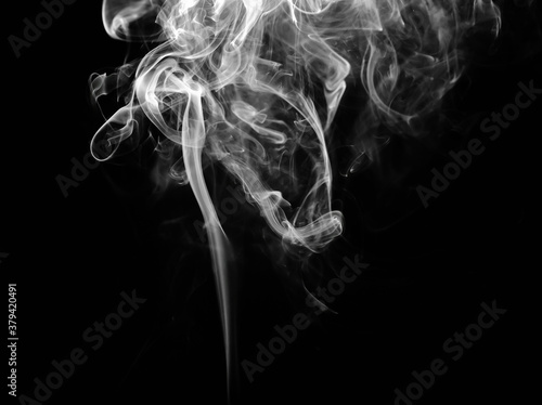 abstract fragment movement of white smoke on black background.