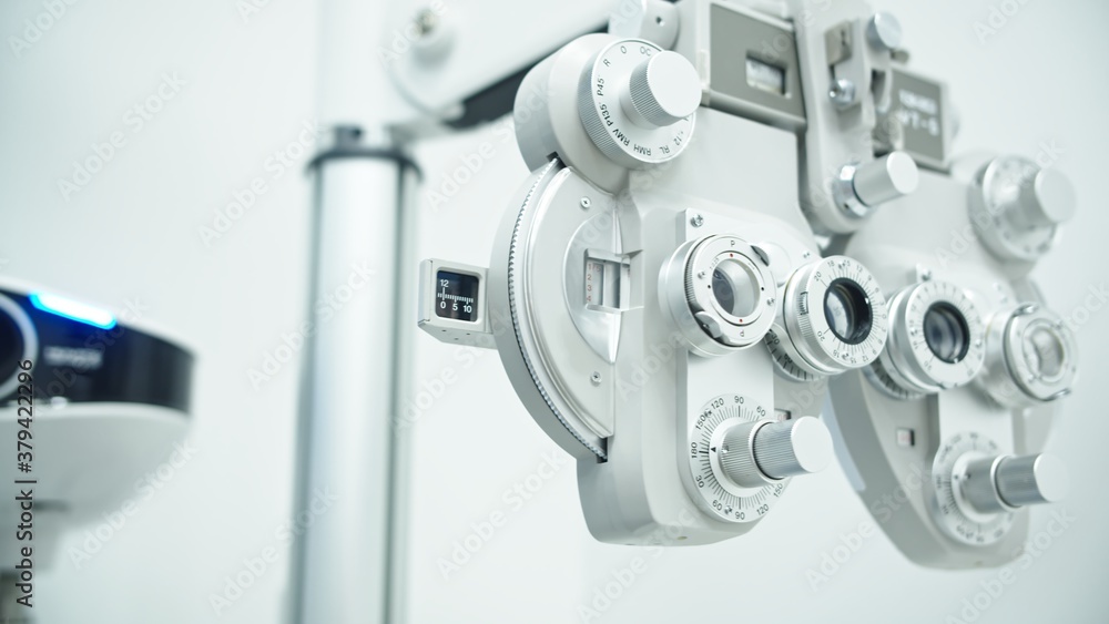 Eye clinic with autorefractor , slit lamp and eye diagnostic tools. High quality photo