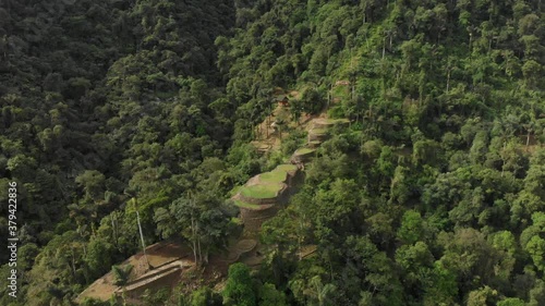 Aerial View of Archeological Site in Jungle Lush of Colombia. Ancient Lost City. Ciudad Perdida Terraces, Drone Shot photo