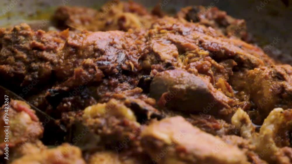 indian style homemade spicy chicken recipe cooking in a pan by chef, stirring chicken curry and cooking chicken recipe, non-veg food coooking indian style homemade spicy chicken recipe cooking in a pan by chef, stirring chicken curry and cooking chicken recipe, non-veg food coooking