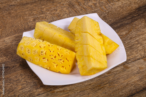 Fototapeta Naklejka Na Ścianę i Meble -  Sliced sweet ripe tasty pineapple