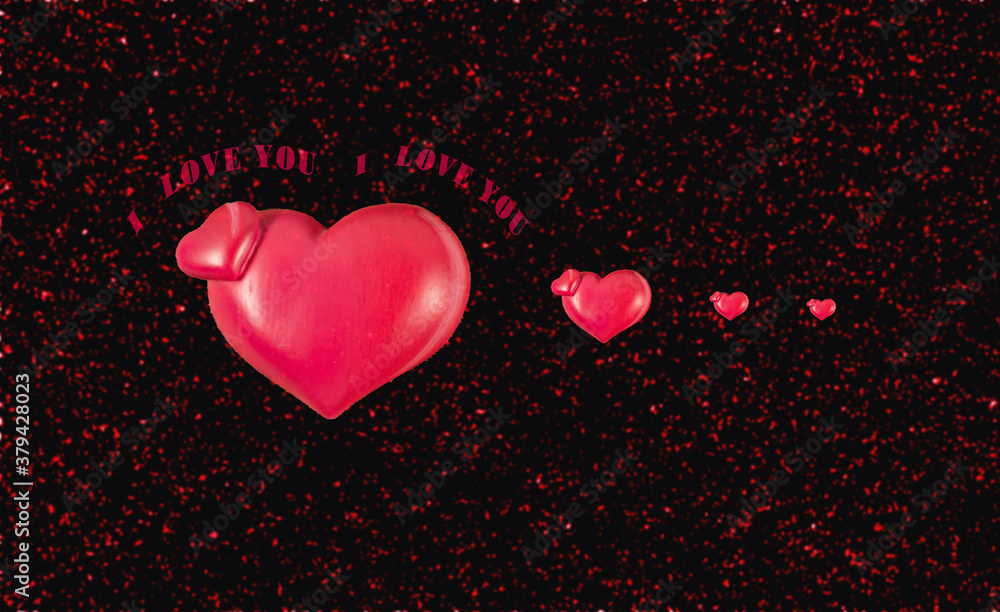 Close up of hearts isolated on black background. Love concept