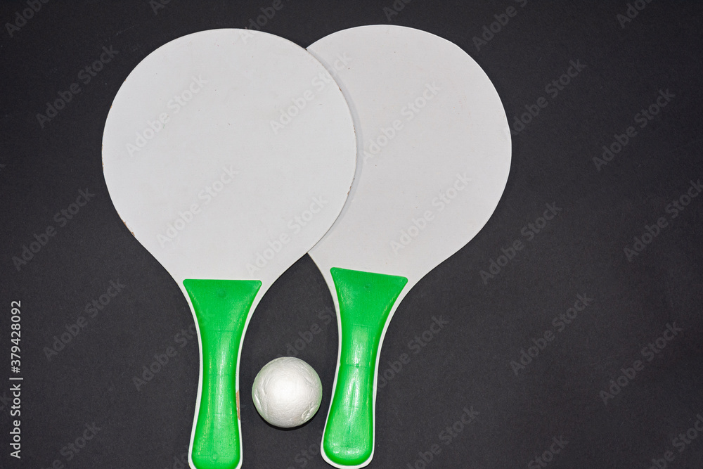 Close up of beach tennis rackets with space for writing. Isolated on background