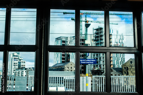 Building works at Grand Canal Dock Dublin seen through the window of the train station