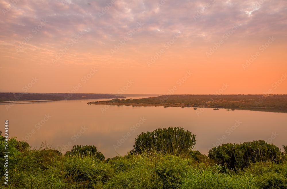 The Kazinga Channel in the Queen Elizabeth National Park in Uganda at sunset.
