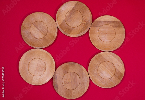 Obraz na płótnie Bamboo saucers arranged in various order, with space to insert letters of text w salonie