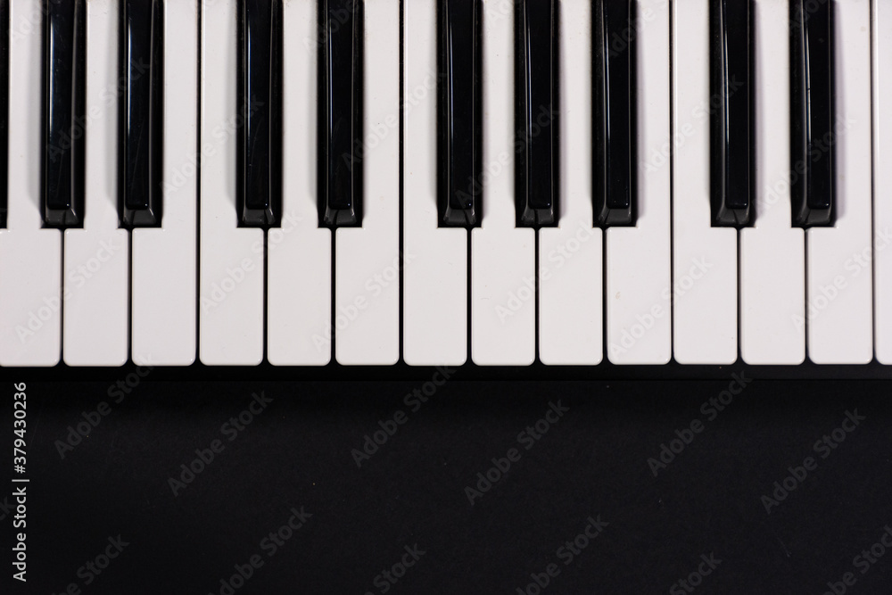 Piano keyboard isolated on colorful background with space for writing. Competition concept Piano keyboard isolated on colorful background with space for writing. Competition concept