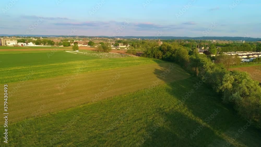 Aerial View of Farmlands and an Amish Cemertery on a Beautiful Sunny Day Aerial View of Farmlands and an Amish Cemertery on a Beautiful Sunny Day