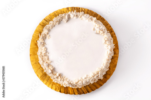 Delicious polvito uruguayo cake with sugar and caramel isolated on white background